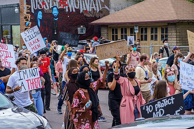 Protests in Minneapolis begin, and the police use tear gas to break them up.