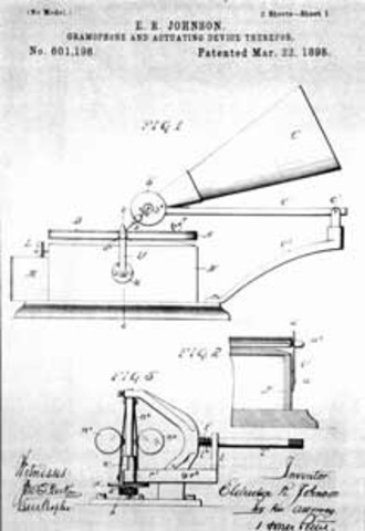 Eldredge Johnson Perfects mass duplication of pre-recorded flat disks.