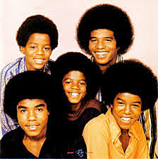 at the age of eleven he began to sing with his brothers in the Jackson five