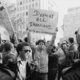 Man holding sign during iranian hostage crisis protest  1979
