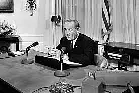 President Johnson announces a slowing to the bombing of North Vietnam, and that he would not seek reelection as president.