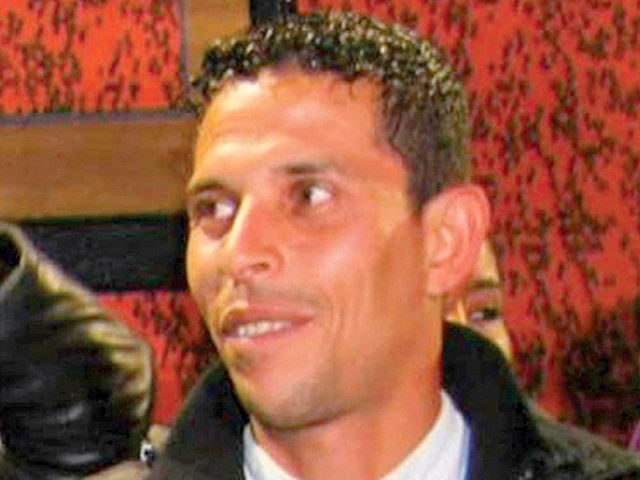 Mohamed Bouazizi sets himself on fire