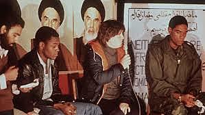 Fifty-two American hostages held in Iran released.