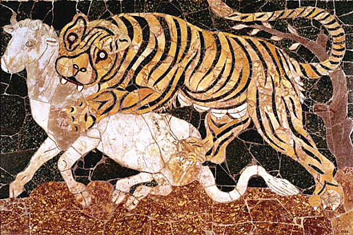 Tigre atacando a un ternero