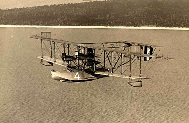 Orville and Wilbur Wright make the first piloted flight on a powered airplane.