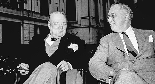 British Prime Minister Winston Churchill and U.S. President Franklin Roosevelt meet in Newfoundland to sign the Atlantic Charter, a declaration on the purposes of the war in fighting against fascism