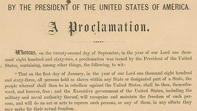 Abraham Lincoln signs Emancipation Proclamation