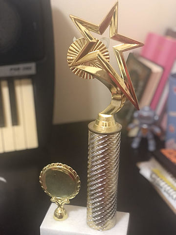 Winning a trophy in a religious competition