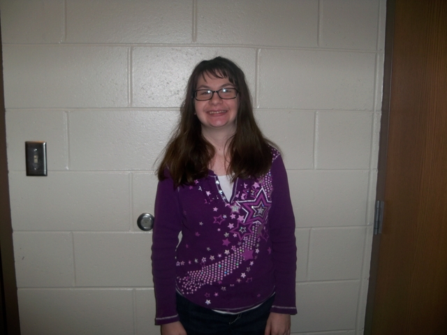 I was born and brought in a stocking w/ word joy on it!