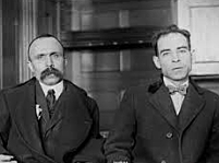 Sacco and Vanzetti arrested for armed robbery and murder