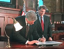 Clinton Signs Telecom Act