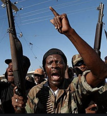 Le coup d'État américain contre Jean-Bertrand Aristide Video