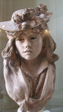Muchacha con sombrero de flores. Rodin