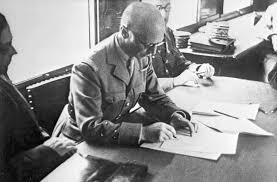 France signs an armistice with Nazi Germany.