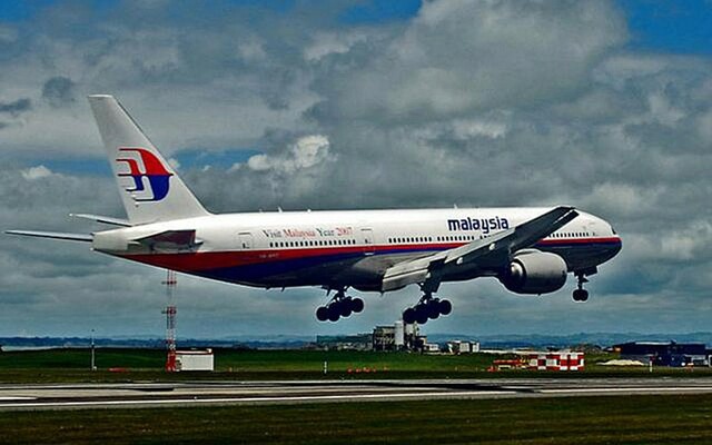 Malaysia Airlines flight 370 with 239 people on board disappears.