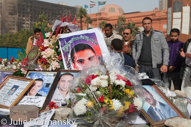 Tahrir Square protestors build a memorial of the fallen martyrs of the Revolution.