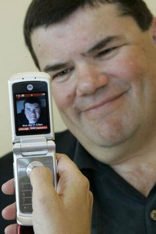 Teléfono con cámara fotográfica.