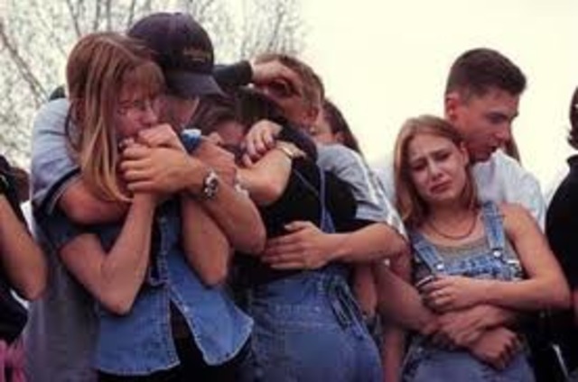 In an attack at Columbine High School, known as the Columbine High School massacre, two senior students killed 12 students and one teacher and injured 21 other students before committing suicide