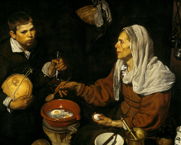 Vieja friendo huevos