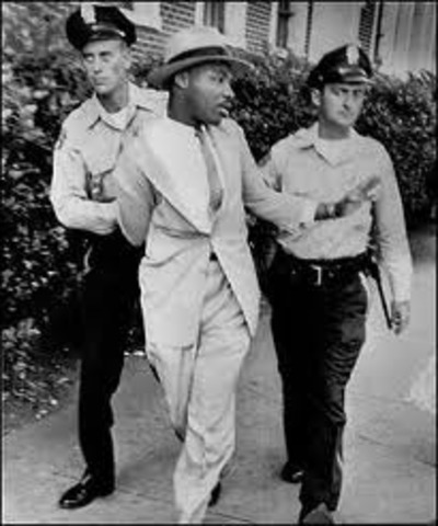 Peaceful demonstrators ruthlessly attacked in Birmingham, Alabama- MLK arrested.