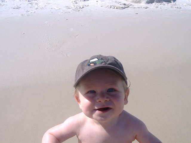 Bryson's first trip to the beach.