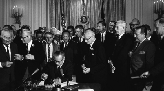 Civil Rights Act of 1964 signed by President Johnson