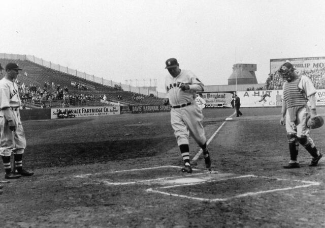 Babe Ruth hits 60 HR in a season