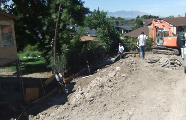 Retaining wall footing
