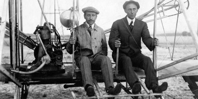 Orville Wright makes the first powered airplane flight