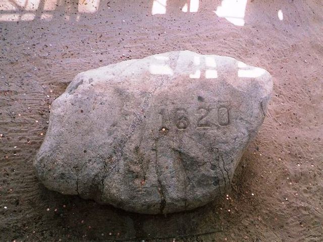Pilgrims land at Plymouth Rock