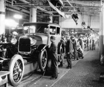 The invention of the assembly line during the Second Industrial Revolution