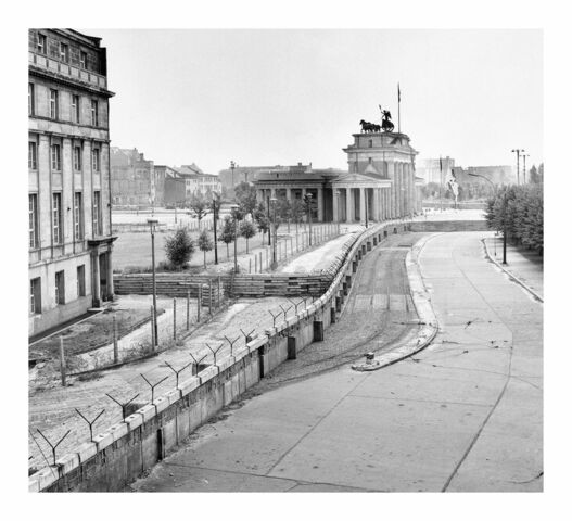 Berlin Wall built to prevent people from leaving communist East Berlin