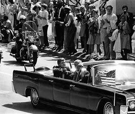John F. Kennedy is assassinated in Dallas, TX