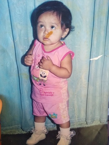 me tomaron un fotografia con la ropa que me trajo mi abuelita el dia de los reyes magos