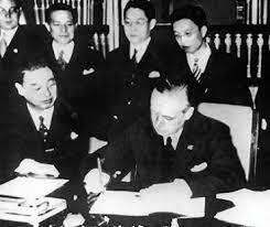 Germany, Italy, and Japan sign the Tripartite Pact.