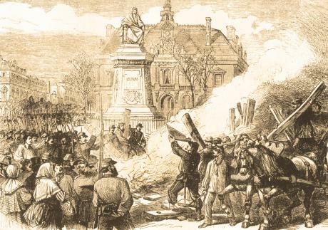 Members of the 137th battalion of the Commune's National Guard publicly burn the guillotine in the Place Voltaire (now Place Léon Blum) in the 11th arrondissement of Paris
