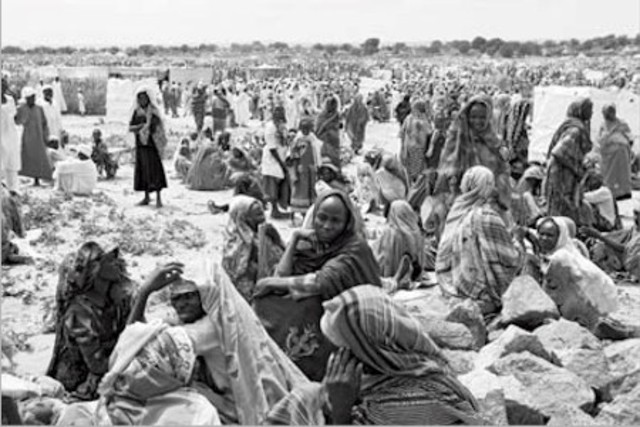 The Sudanese army moves to quell rebel uprising in webstern region of Darfur; hundreds of thousands of refugees flee to neighbouring Chad