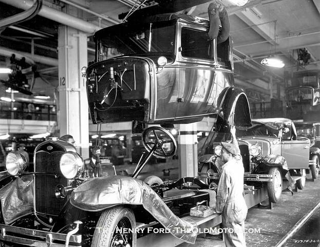 Henry Ford implements the assembly line
