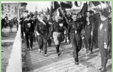 Mussolini threatens to march on Rome