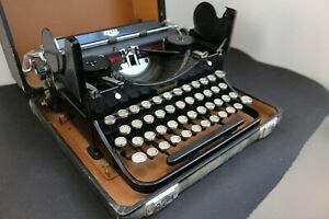 Máquina de escribir portátil.