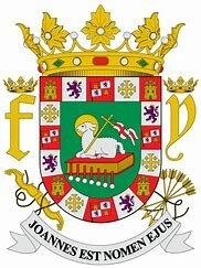 Los  reyes de   Espana le otroga   el  escudo a  Puerto   Rico.