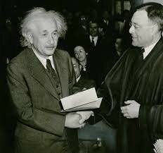 Albert Einstein receives the Nobel Prize in physics.