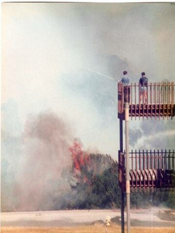 Fire in the hills around the D.C. Power building almost burns it down