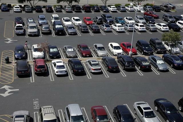 Cars are starting to pull into the parking lot.