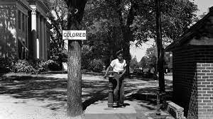 Jim Crow Laws Start in South (1877)
