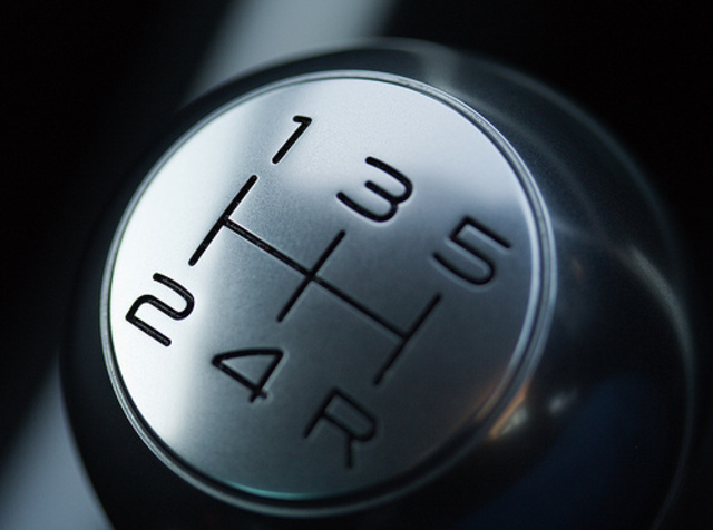 learns how to drive a stickshift