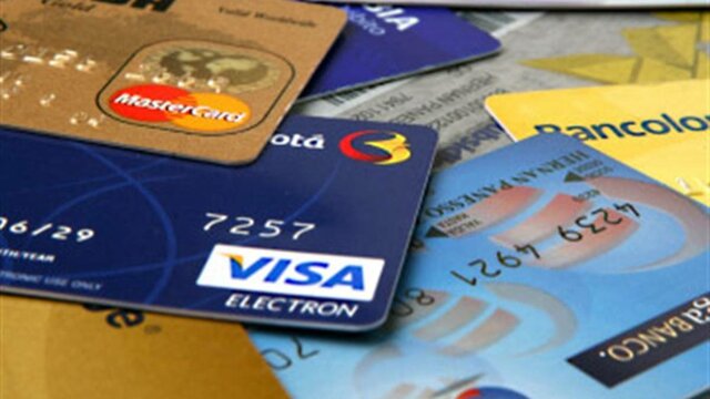 DINERO PLASTICO 2000 d.C