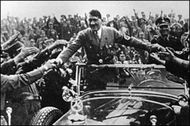 Hitler invades poland beginning WWII