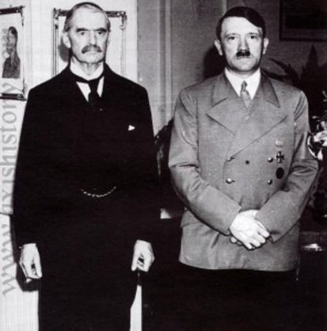Britain’s Neville Chambelin and Hitler meet at the Munich Conference