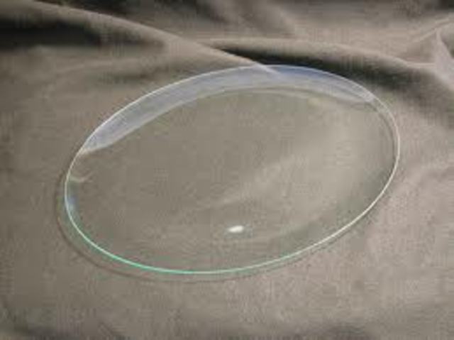 Charlie laughed at the boy with a mental challenge, who dropped the plates.